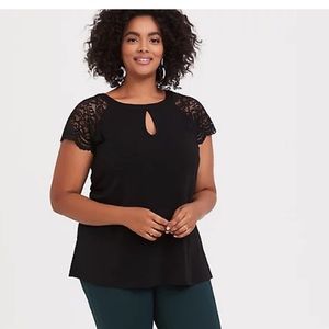 Black shirt with lace sleeves